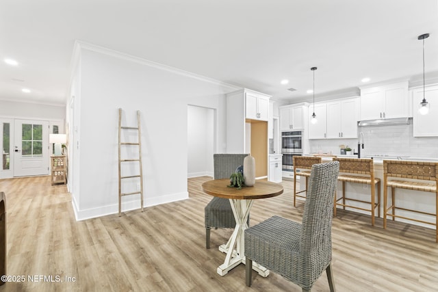 2013 Wedge Ct, Green Cove Springs, FL 32043 - dining room with ornamental molding, recessed lighting, light wood-style floors, and baseboards