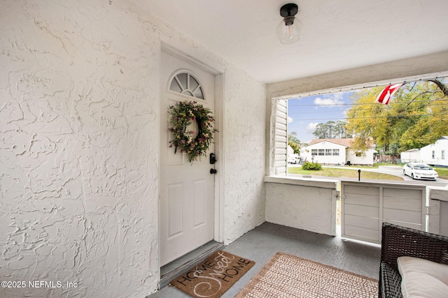1171 Scotten Rd, Jacksonville, FL 32205 - property entrance featuring stucco siding