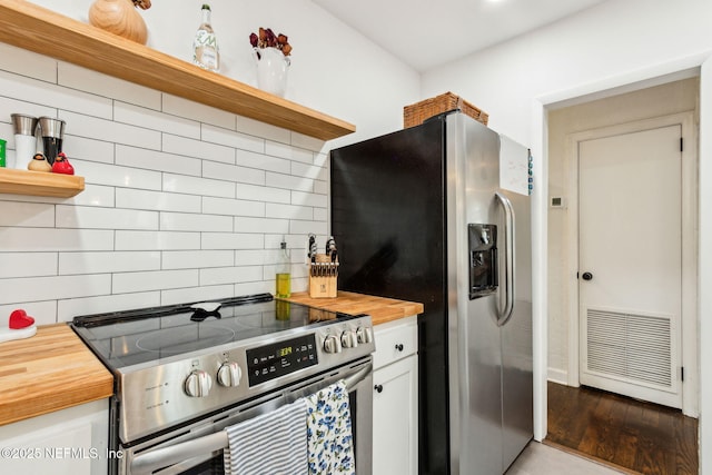 1171 Scotten Rd, Jacksonville, FL 32205 - kitchen with wood counters, open shelves, and stainless steel appliances