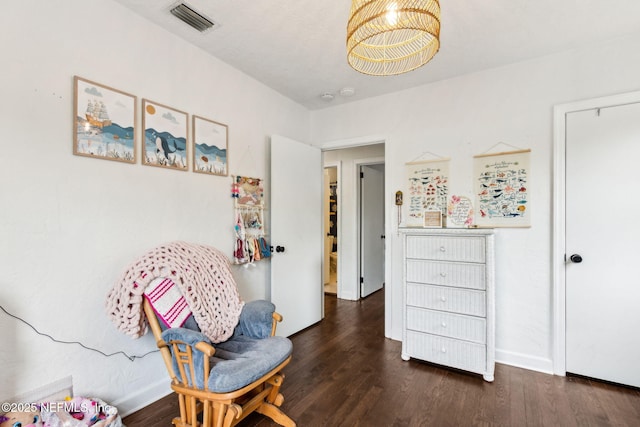 1171 Scotten Rd, Jacksonville, FL 32205 - living area with baseboards, visible vents, and wood finished floors