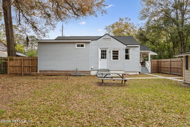 1171 Scotten Rd, Jacksonville, FL 32205 - back of house with fence and a yard