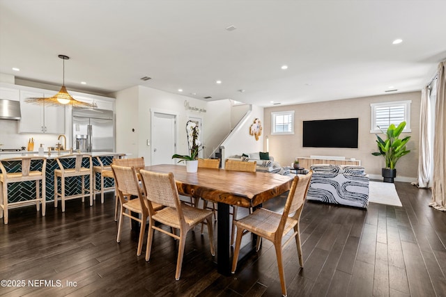 31 26th Ave S, Jacksonville Beach, FL 32250 - dining space featuring plenty of natural light, dark wood finished floors, and stairway