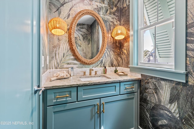 31 26th Ave S, Jacksonville Beach, FL 32250 - bathroom with vanity and tasteful backsplash