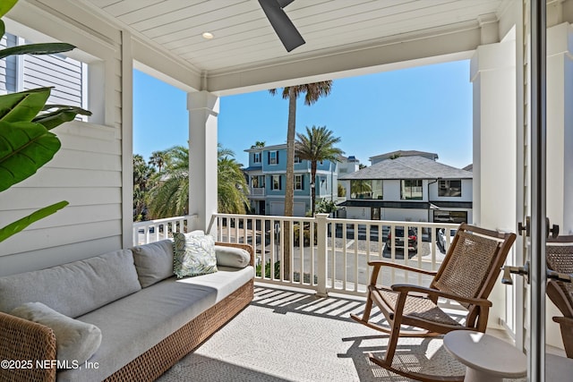 31 26th Ave S, Jacksonville Beach, FL 32250 - balcony featuring ceiling fan, an outdoor hangout area, and a residential view