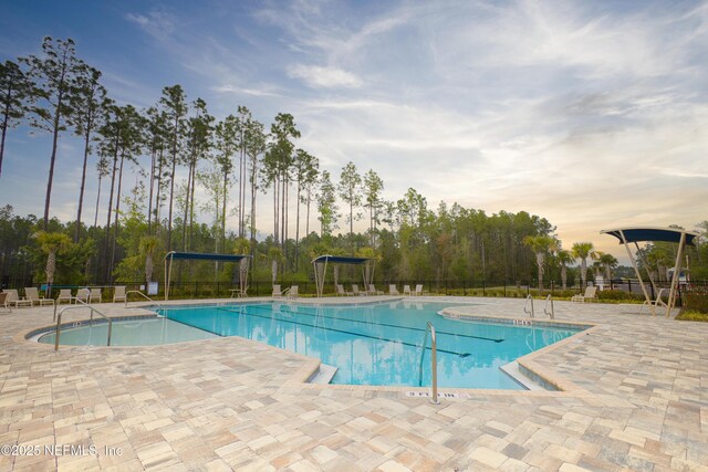 79 Coastline Way, Saint Augustine, FL 32092 - pool featuring a patio area and fence