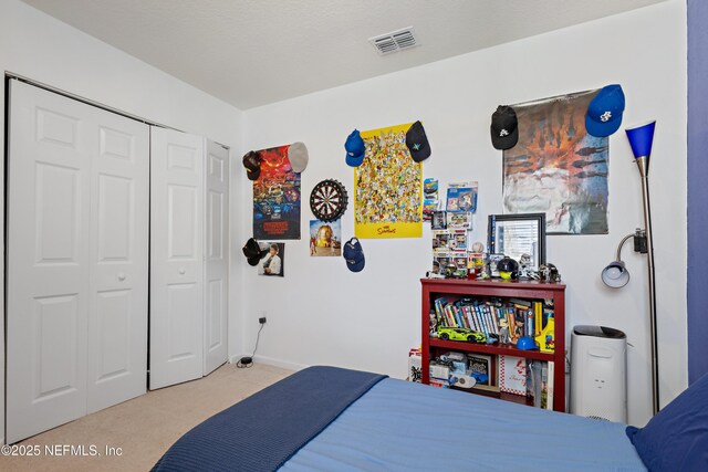 79 Coastline Way, Saint Augustine, FL 32092 - bedroom featuring a closet, carpet flooring, visible vents, and baseboards