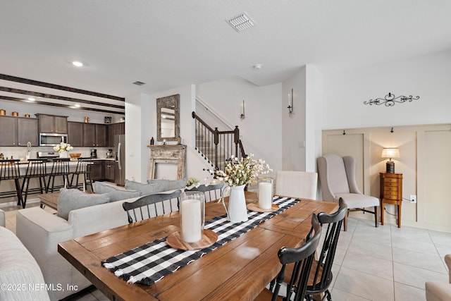 79 Coastline Way, Saint Augustine, FL 32092 - dining area featuring stairs, visible vents, recessed lighting, and light tile patterned floors