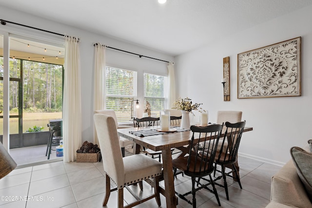 79 Coastline Way, Saint Augustine, FL 32092 - dining area with baseboards and light tile patterned floors