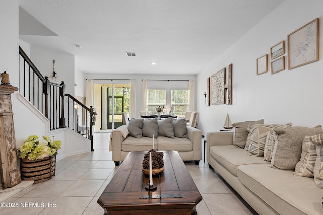 79 Coastline Way, Saint Augustine, FL 32092 - living area featuring light tile patterned flooring, stairs, and visible vents