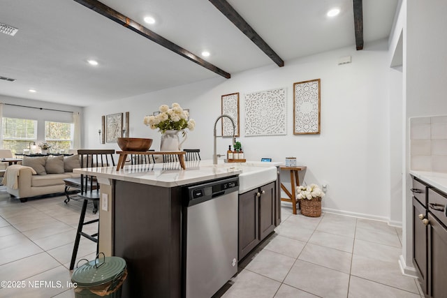 79 Coastline Way, Saint Augustine, FL 32092 - kitchen with a kitchen breakfast bar, open floor plan, stainless steel dishwasher, a sink, and beamed ceiling