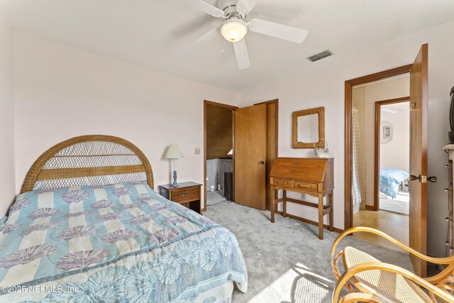 27 Flagler Dr, Palm Coast, FL 32137 - bedroom with light carpet, visible vents, and ceiling fan