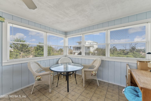 27 Flagler Dr, Palm Coast, FL 32137 - sunroom / solarium with a healthy amount of sunlight and a textured ceiling