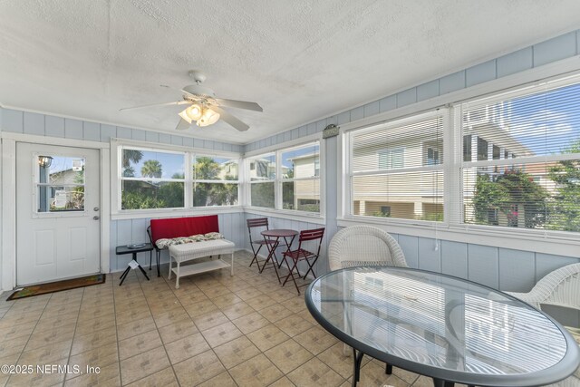 27 Flagler Dr, Palm Coast, FL 32137 - sunroom / solarium featuring outdoor dining space and a ceiling fan