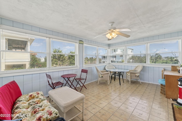 27 Flagler Dr, Palm Coast, FL 32137 - sunroom / solarium with a healthy amount of sunlight, a textured ceiling, and a ceiling fan