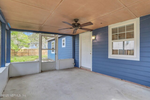 4245 New Hampshire Rd, Elkton, FL 32033 - unfurnished sunroom with a ceiling fan
