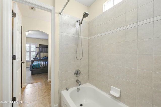 bathroom featuring shower / bath combination and tile patterned floors