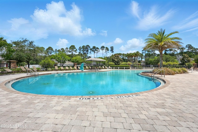 community pool featuring a patio