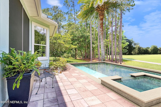 95150 Starling Ct, Fernandina Beach, FL 32034 - view of swimming pool featuring view of scattered trees, a lawn, a patio area, and a pool with connected hot tub