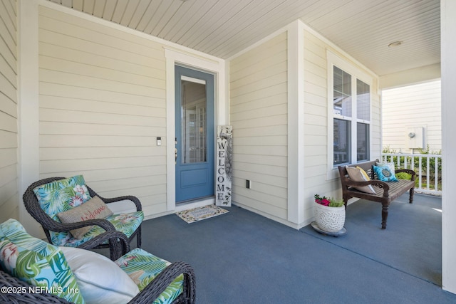 entrance to property featuring covered porch