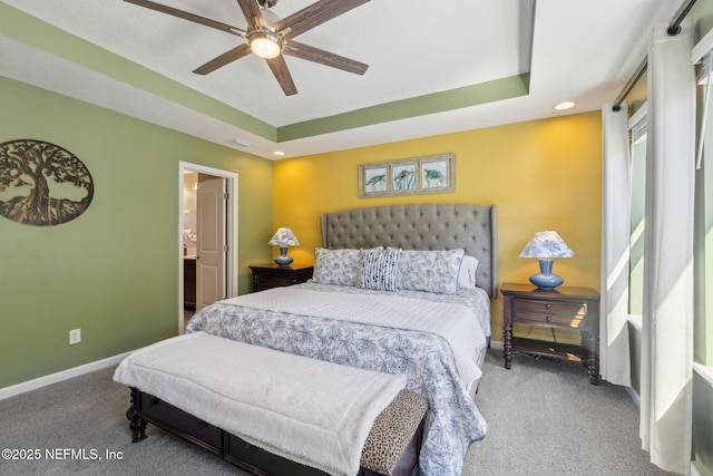 bedroom with visible vents, carpet, baseboards, recessed lighting, and a raised ceiling