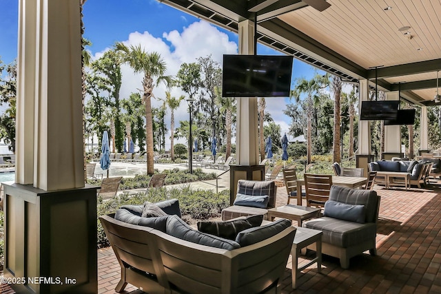 wooden terrace featuring outdoor lounge area