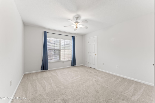 11066 Castlemain Cir, Jacksonville, FL 32256 - unfurnished room with carpet floors, baseboards, and ceiling fan