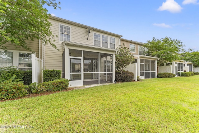 11066 Castlemain Cir, Jacksonville, FL 32256 - back of property with a yard and a sunroom