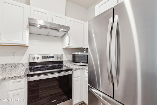 7686 Merchants Way, Jacksonville, FL 32222 - kitchen featuring white cabinetry, under cabinet range hood, and stainless steel appliances