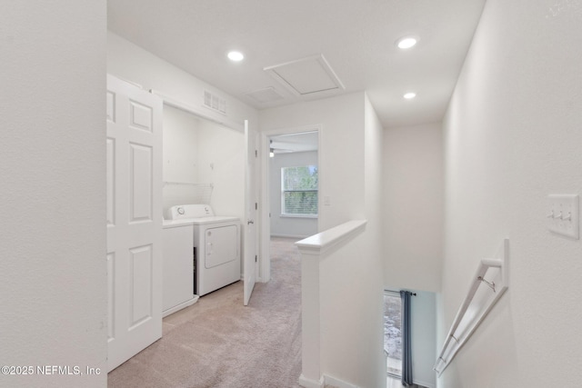 7686 Merchants Way, Jacksonville, FL 32222 - hall with an upstairs landing, independent washer and dryer, recessed lighting, and light carpet