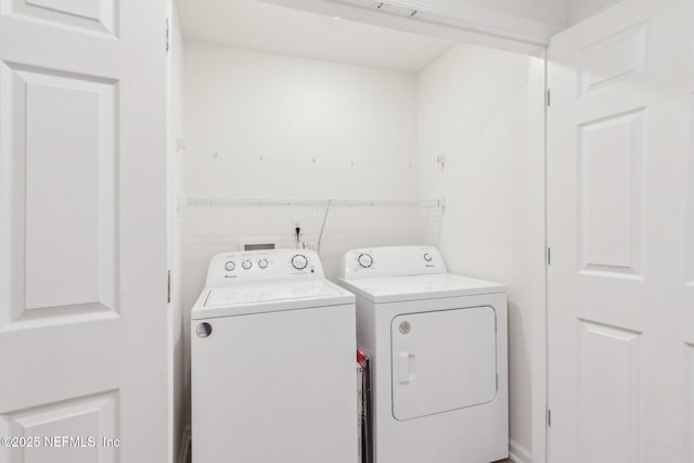 7686 Merchants Way, Jacksonville, FL 32222 - laundry room featuring laundry area and separate washer and dryer