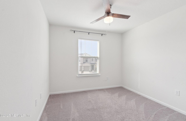 7686 Merchants Way, Jacksonville, FL 32222 - empty room with baseboards, ceiling fan, and carpet floors