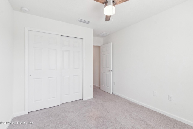 7686 Merchants Way, Jacksonville, FL 32222 - unfurnished bedroom with a closet, carpet flooring, visible vents, baseboards, and a ceiling fan