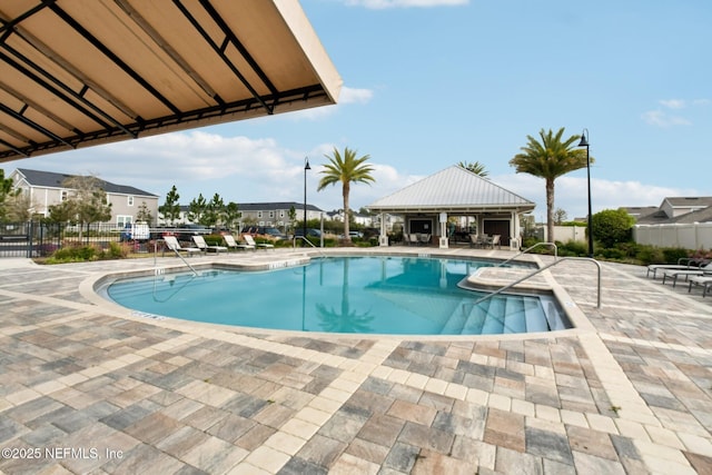 7686 Merchants Way, Jacksonville, FL 32222 - community pool with fence, a gazebo, and a patio area