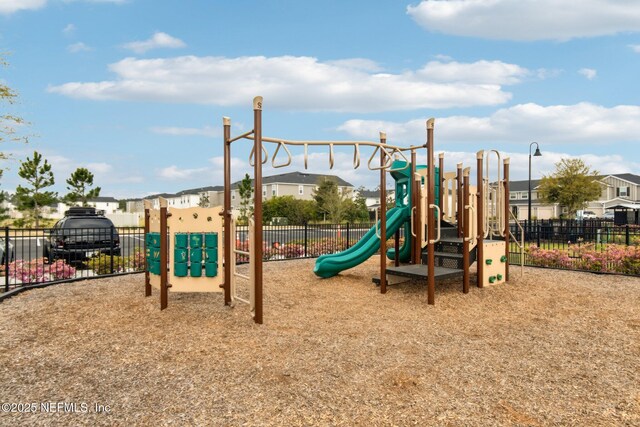 7686 Merchants Way, Jacksonville, FL 32222 - community play area featuring a residential view and fence