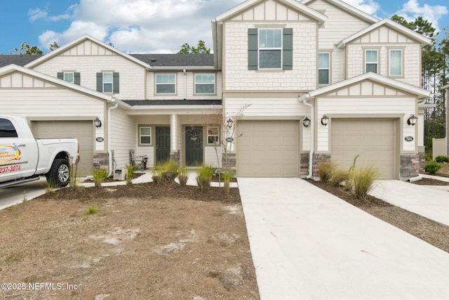 7686 Merchants Way, Jacksonville, FL 32222 - view of front of home with stone siding, a garage, and concrete driveway
