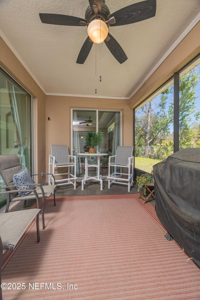 784 Crestwood Dr, Saint Augustine, FL 32086 - sunroom / solarium featuring a ceiling fan