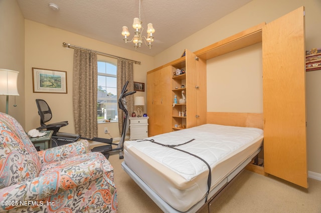 784 Crestwood Dr, Saint Augustine, FL 32086 - bedroom with carpet floors, a notable chandelier, baseboards, and a textured ceiling