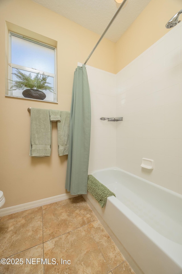 784 Crestwood Dr, Saint Augustine, FL 32086 - bathroom featuring baseboards, toilet, and shower / tub combo