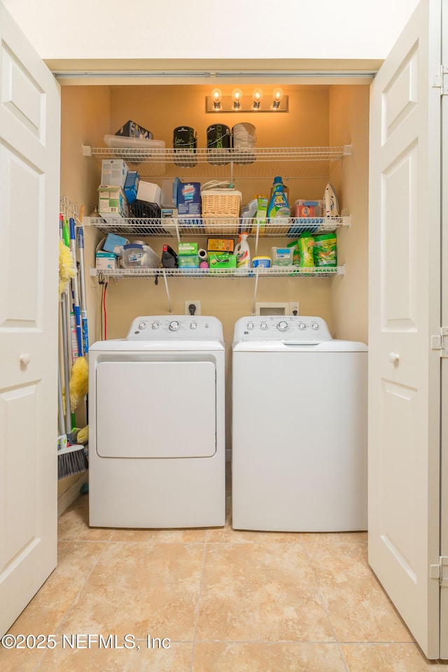 784 Crestwood Dr, Saint Augustine, FL 32086 - washroom featuring laundry area, tile patterned floors, and separate washer and dryer