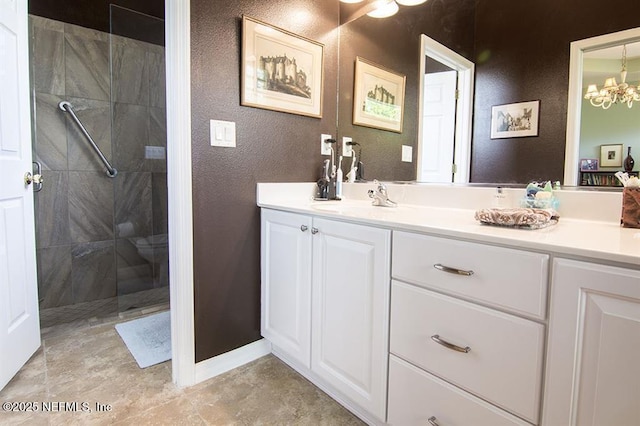 784 Crestwood Dr, Saint Augustine, FL 32086 - full bath featuring vanity, a textured wall, a chandelier, and a walk in shower