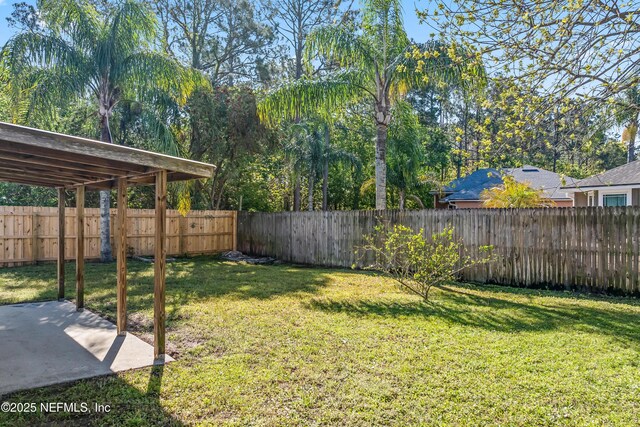11326 Hendon Dr, Jacksonville, FL 32246 - view of yard featuring a fenced backyard and a patio area