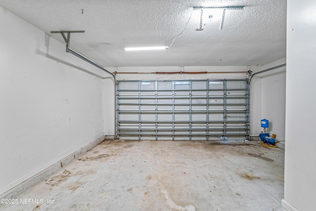 11326 Hendon Dr, Jacksonville, FL 32246 - garage featuring baseboards