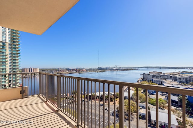 balcony featuring a water view