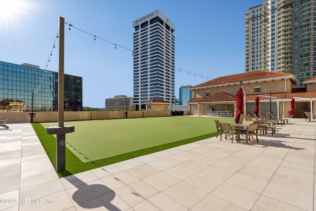 view of community with a patio area