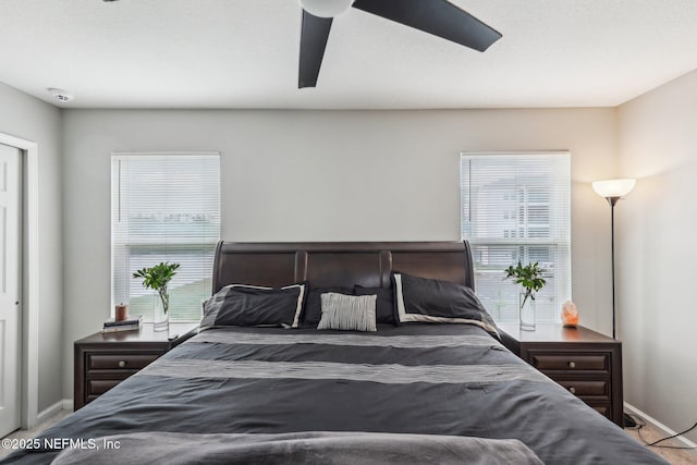 7802 Merchants Way, Jacksonville, FL 32222 - bedroom with baseboards and ceiling fan