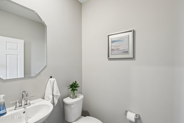 7802 Merchants Way, Jacksonville, FL 32222 - bathroom with toilet and a sink