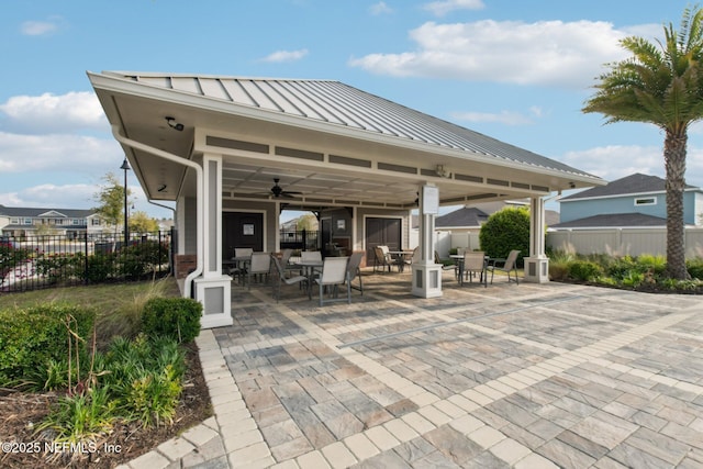 7802 Merchants Way, Jacksonville, FL 32222 - view of patio / terrace featuring fence, outdoor dining area, and a ceiling fan