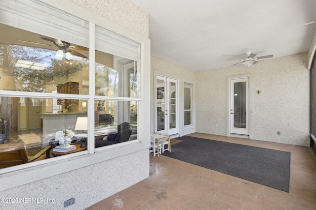 view of patio / terrace with french doors and ceiling fan