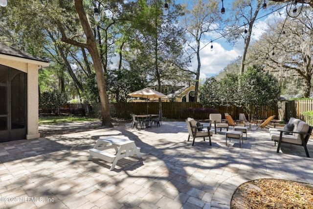 view of patio / terrace featuring a fenced backyard and outdoor dining space