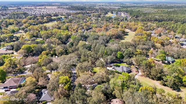bird's eye view with a forest view